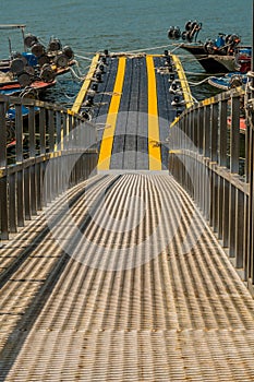 Metal gangplank to floating dock