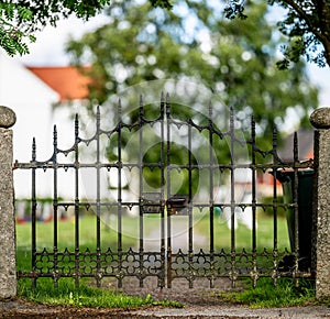 Metal gate to an old grave yard..