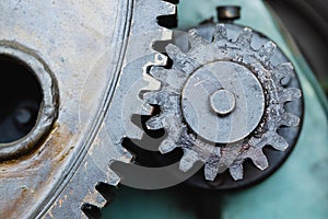 Metal gear cogwheel in steel heavy industry machine with dirty grease oil lube