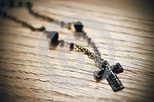 Metal Gothic black cross with black beads on the chain