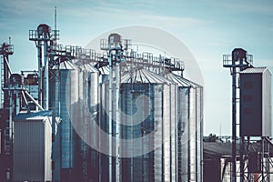 Metal grain elevator in agricultural zone