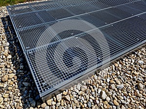 metal grates and a hatch on the roof garden. sheet metal and