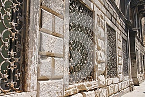 Metal grates on the windows of the old houses in Venice,