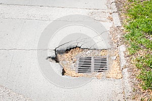 Metal gratings or rain gutter grid for water on the street to prevent flood and cover drainage sewerage or sewage system hole