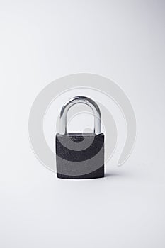 Metal, grey and closed padlock