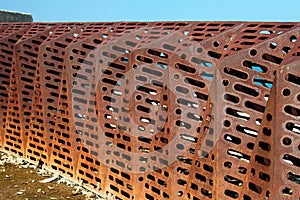 Metal grid as a waste trap system for filtering river water and blocking wastes