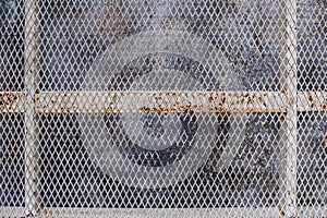 A metal grid background was used to create a high-altitude walking grate as it was lighter than concrete and was visible below.