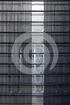 Metal grill background. refrigeration equipment. The back wall of the home refrigerator with a heat-dissipating grille.