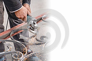 Metal grinding with angle grinder. Banner, copy-space. Copy space Sparks fly on the sides.