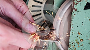 Metal Grinding on an Electric Grinding Wheel