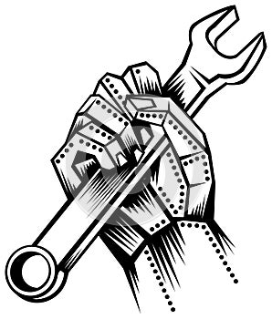 Metal hand with spanner photo