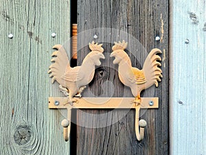 Metal Hanger in Shape of Two Roosters