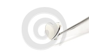 Metal heart in white background