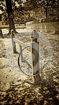 Metal Hoop on hitching post in Williamsburg Virginia in Sepia photo