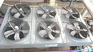 Metal industrial air cooling system vent.  Industrial blower fan cooling biogas powerplant system .