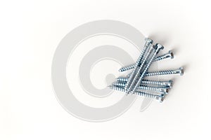 Metal ison screws isolated on white background photo