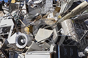 Metal junk landfill scrap metals pile recycling recycle household appliance photo