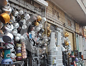 Metal kettles, pots, stoves in the street market, Shiraz, Iran