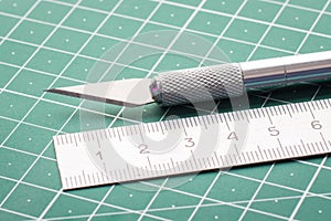 Metal knife and ruler