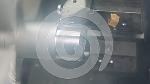 Metal lathe close-up. production of high precision metal parts