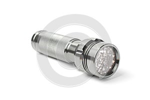 Metal LED flashlight on a white background, isolate