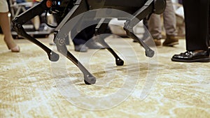 metal legs of a robot dog close-up in motion