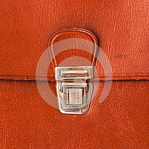 Metal lock old red leather briefcase