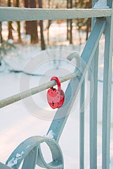 Metal lock symbol of love in the form of a red heart, valentine