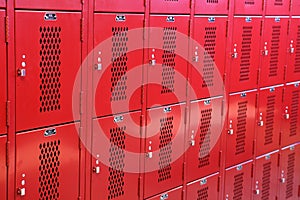 Metal lockers in a high school locker room.
