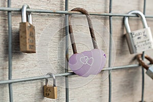 Metal locks. A bunch of locks. Heart locks. A symbol of love