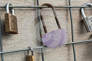 Metal locks. A bunch of locks. Heart locks. A symbol of love