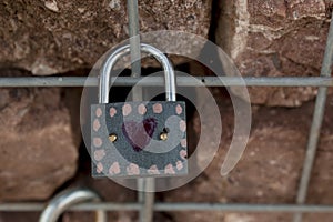 Metal locks. A bunch of locks. Heart locks. A symbol of love