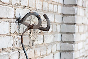 Metal loop in the brick wall