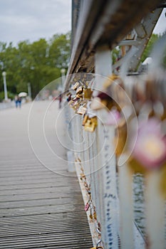 Love Padlocks Hanging on the Railing of the Bridge