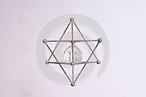 Metal Magen David with crystal ball inside