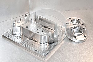 Metal mold and steel flanges. Milling industry. CNC technology.