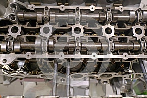 Metal monoblock and pistols of the car engine close-up.  Part of the motor. Industrial part. Car plant