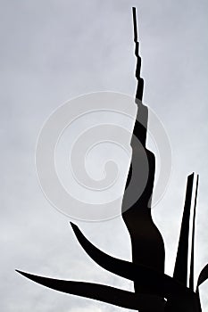 Metal Monument. On the sky background. Peace Park Almada Portugal. Monumento de ferro. Parque de Paz. CÃÂ©u nublado. photo