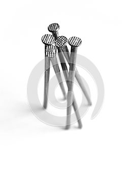 Metal nail isolated in white background.