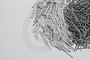 Metal nails isolated on white background. working tools