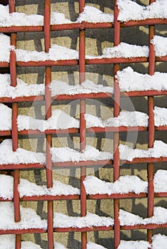 Metal net with snow