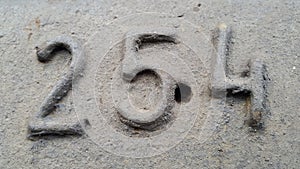 Metal number 254. Texture of rusty metal in the form of figures 254