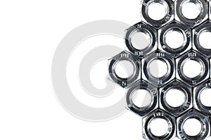 Metal nuts isolated on white background. Chromed screw nuts isolated. Steel nuts isolated. Nuts and bolts. Tools for work.