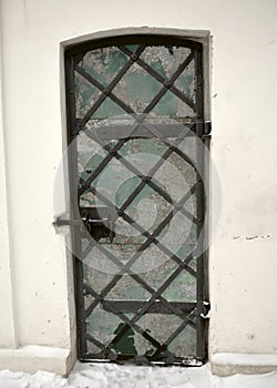 Metal ormanented old door of Illilskaya church