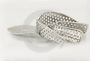Metal perforated lower dental impression tray