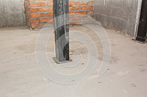 Metal pillar inside new house construction. Metal pillar construction idoors