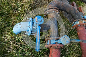 Metal pipes, gas pipeline or irrigation on a field