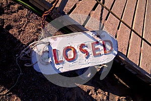 Metal plate on the sand tells that closed