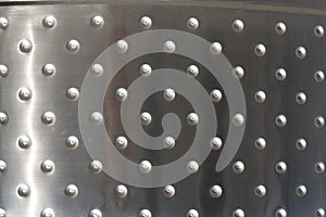 Metal plates with rivets background or texture photo