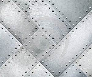 Metal plates rotated 45 degrees with rivets background or texture